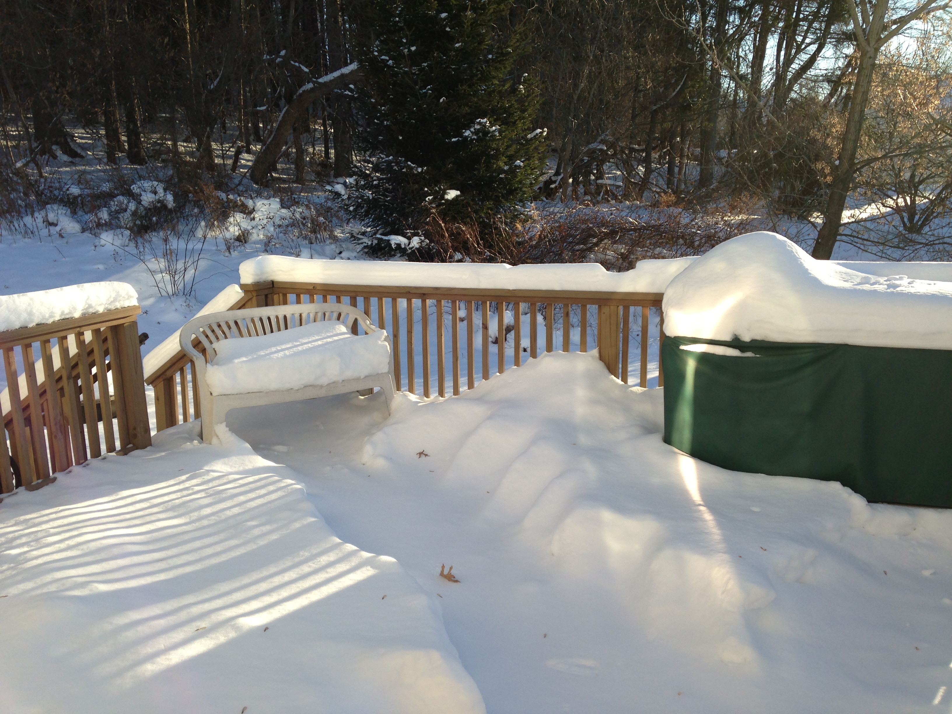 deck and backyard with deep snow