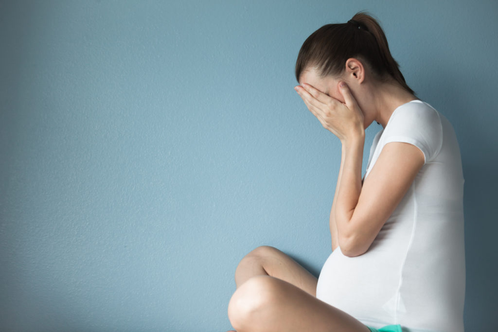 depression, sad pregnant woman